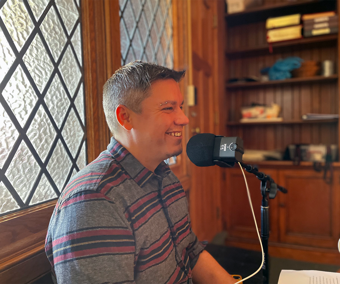 A man recording a podcast